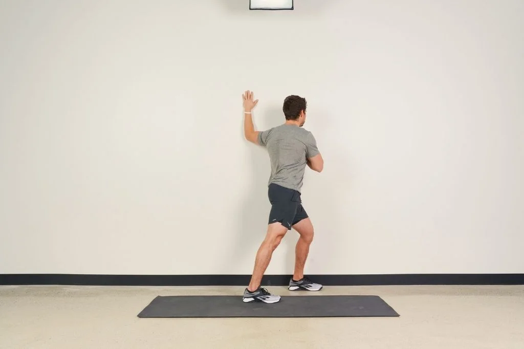 A demonstration of the Chest Opener at wall stretch