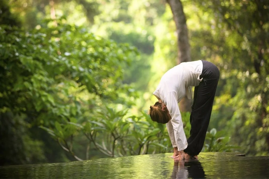 A demonstration of the Standing Forward Bend stretch